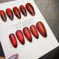 Handmade Ruby Eclipse Cat Eye Gel Press On Nails – Reusable, Customizable Manicure
