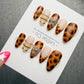 4 for 3 timed offer Amber Petal Reverie Press On Nails, Tortoiseshell and Nude Almond, 3D Flower and Gold Accents