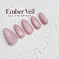 a collection of pink glittery nail polish bottles arranged in a row, with the text "Ember Veil CAT EYE EFFECT" displayed above them.