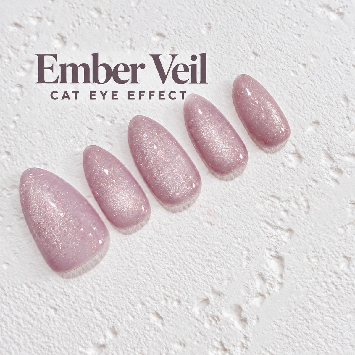 a collection of pink glittery nail polish bottles arranged in a row, with the text "Ember Veil CAT EYE EFFECT" displayed above them.