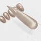 a close-up view of a glittery nail polish swatch on a white background.