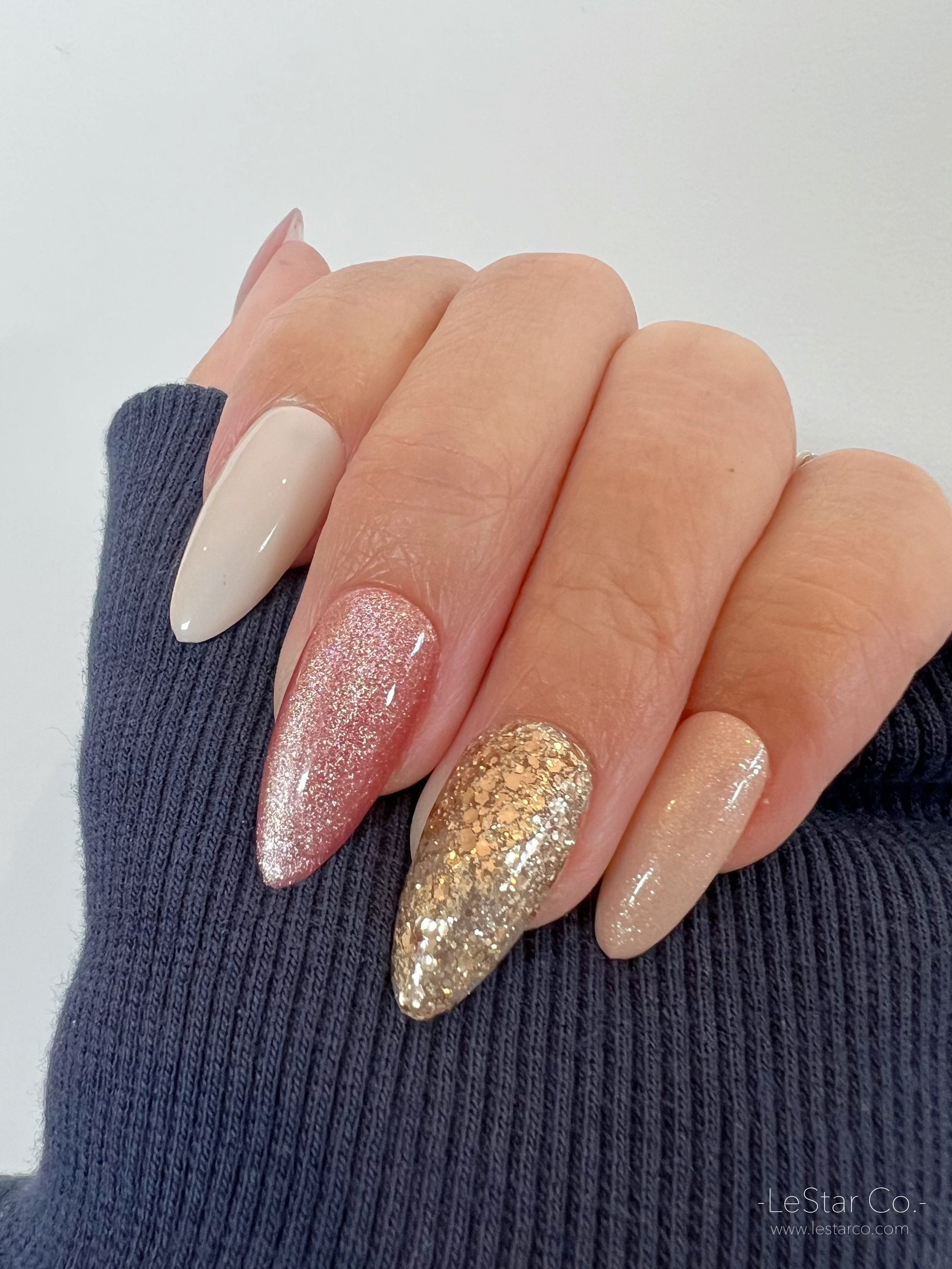 gold and pink nails